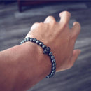 Hematite Bead Bracelet with Skull Charm